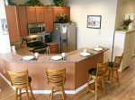 Fully Equipped Kitchen w Granite Counters and Stainless Steel Appliances - 4 Swivel Stools at the counter